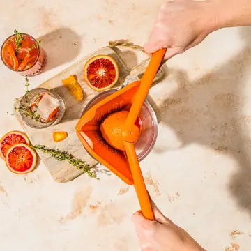 Fluicer, Orange - Fold Flat Easy Juicer